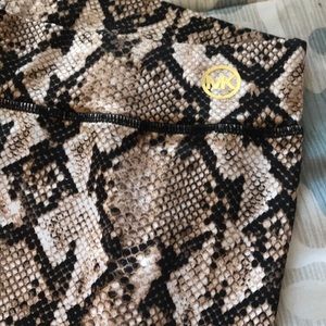 MK snake skin leggings